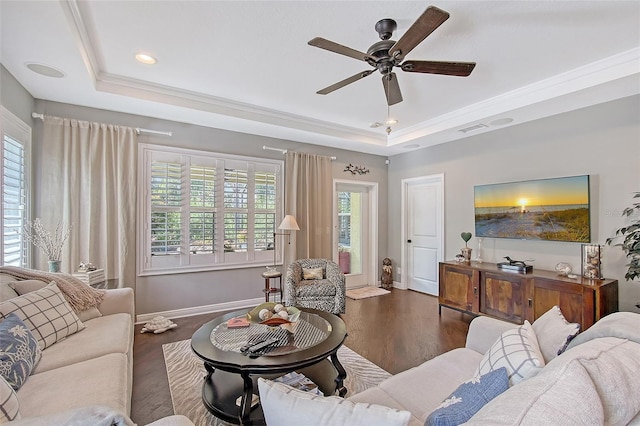 12133 Forest Park Cir, Bradenton, FL 34211 - living room with a raised ceiling, wood finished floors, ceiling fan, baseboards, and recessed lighting