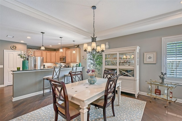 12133 Forest Park Cir, Bradenton, FL 34211 - dining space with dark wood-style floors, a chandelier, recessed lighting, and baseboards