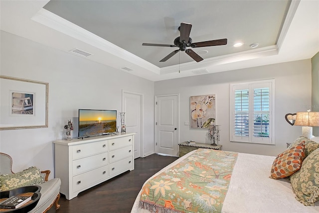 12133 Forest Park Cir, Bradenton, FL 34211 - bedroom with a raised ceiling, dark wood-style flooring, ornamental molding, a ceiling fan, and recessed lighting