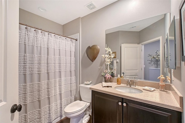 12133 Forest Park Cir, Bradenton, FL 34211 - full bathroom with vanity, toilet, and curtained shower