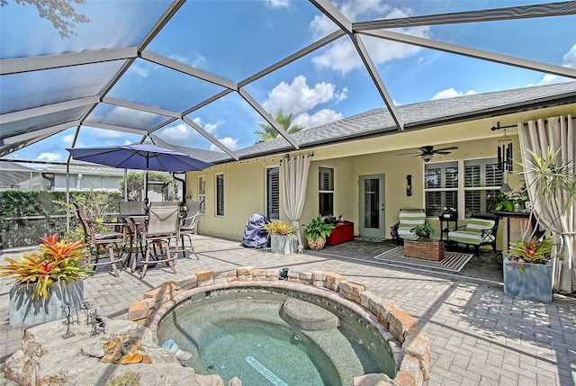 12133 Forest Park Cir, Bradenton, FL 34211 - view of swimming pool featuring ceiling fan, a patio, an in-ground hot tub, and glass enclosure