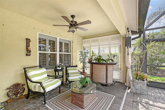 12133 Forest Park Cir, Bradenton, FL 34211 - sunroom with ceiling fan and healthy amount of natural light