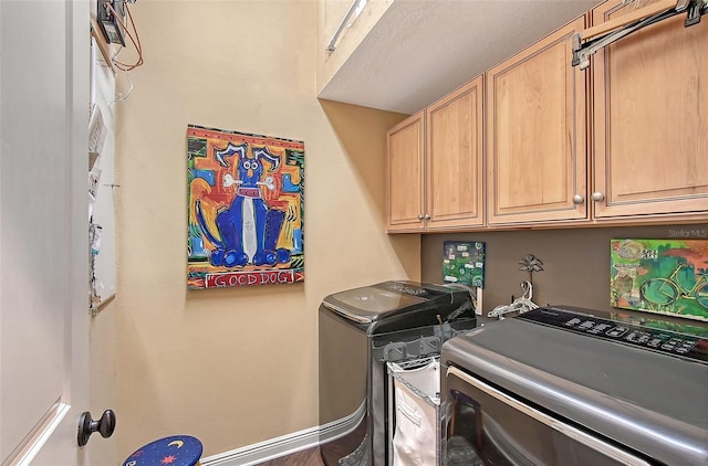 12133 Forest Park Cir, Bradenton, FL 34211 - washroom with cabinet space and separate washer and dryer