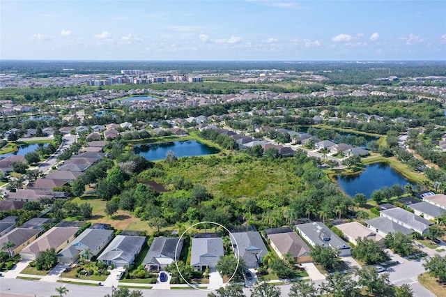 12133 Forest Park Cir, Bradenton, FL 34211 - aerial view of property and surrounding area with nearby suburban area and a large body of water