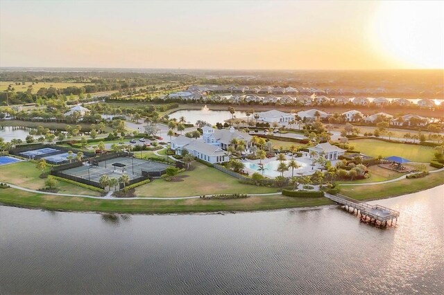 8195 Redonda Loop, Lakewood Ranch, FL 34202 - aerial view at dusk featuring a water view and a residential view