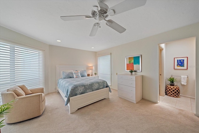 bedroom featuring light carpet, baseboards, a ceiling fan, and recessed lighting