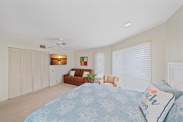 bedroom featuring carpet and a ceiling fan