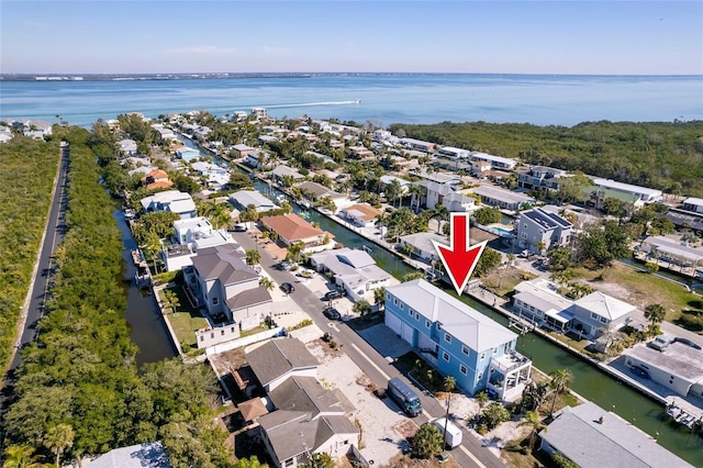 aerial view with a residential view and a water view