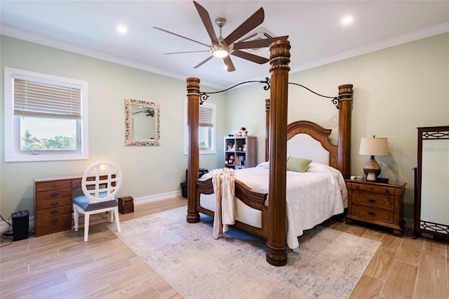 bedroom featuring crown molding, baseboards, and light wood-style floors