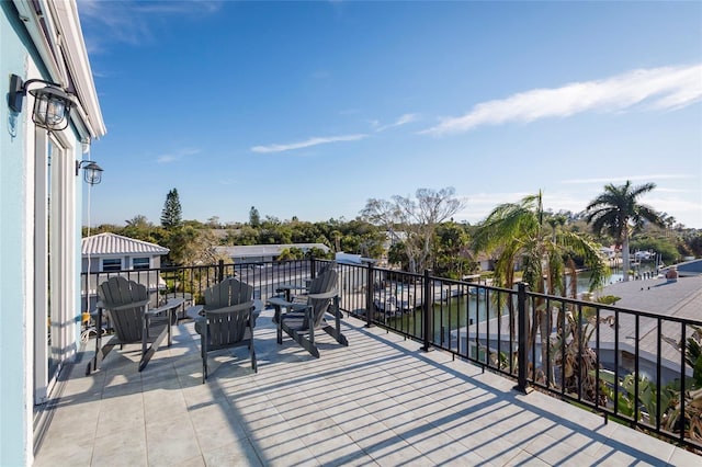view of patio / terrace with a balcony