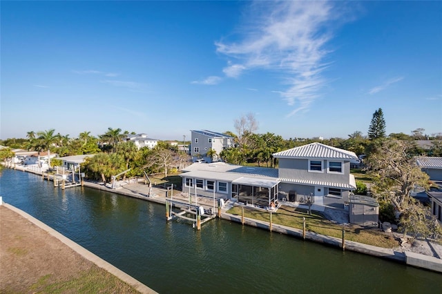 view of dock with a water view and boat lift