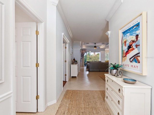 1313 Thornapple Dr, Osprey, FL 34229 - corridor featuring light tile patterned floors and ornamental molding