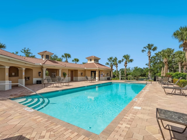 1313 Thornapple Dr, Osprey, FL 34229 - community pool featuring a patio