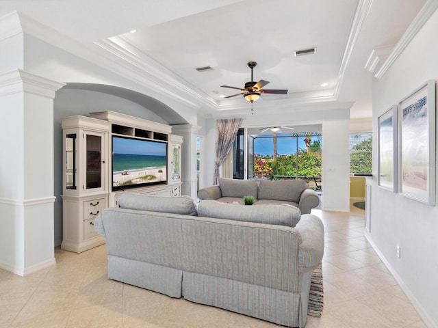 1313 Thornapple Dr, Osprey, FL 34229 - tiled living area featuring a tray ceiling, ceiling fan, ornamental molding, recessed lighting, and baseboards
