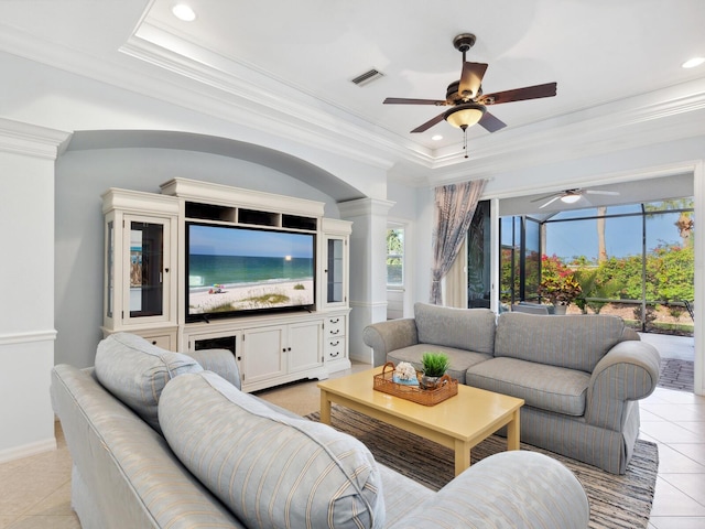 1313 Thornapple Dr, Osprey, FL 34229 - living area with a ceiling fan, light tile patterned floors, crown molding, a raised ceiling, and recessed lighting
