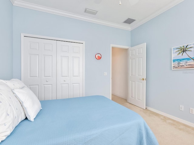 1313 Thornapple Dr, Osprey, FL 34229 - bedroom with ornamental molding, a closet, light carpet, a ceiling fan, and baseboards