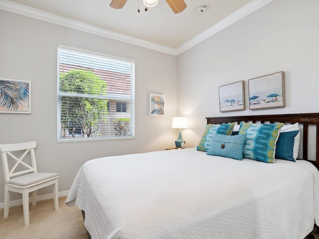 1313 Thornapple Dr, Osprey, FL 34229 - bedroom with crown molding, light carpet, baseboards, and ceiling fan