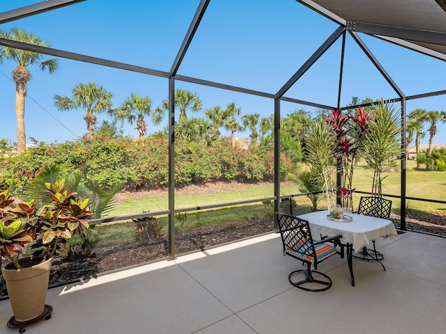 1313 Thornapple Dr, Osprey, FL 34229 - view of patio with a lanai and outdoor dining space