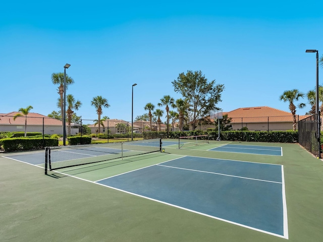 1313 Thornapple Dr, Osprey, FL 34229 - view of tennis court featuring community basketball court