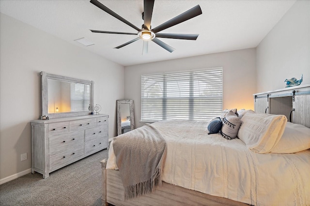 bedroom featuring a ceiling fan, baseboards, and light colored carpet
