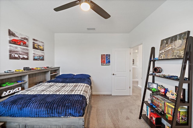 bedroom with baseboards, ceiling fan, carpet flooring, and visible vents