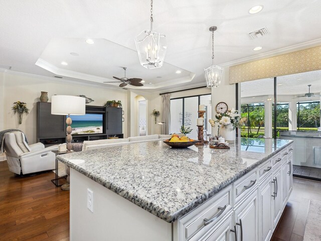 2525 Vaccaro Dr, Sarasota, FL 34231 - kitchen with crown molding, open floor plan, and visible vents