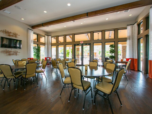 2525 Vaccaro Dr, Sarasota, FL 34231 - dining space featuring a healthy amount of sunlight, recessed lighting, beam ceiling, and wood finished floors