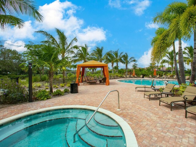 2525 Vaccaro Dr, Sarasota, FL 34231 - community pool featuring fence, a patio, and a gazebo