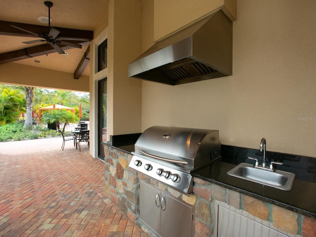 2525 Vaccaro Dr, Sarasota, FL 34231 - view of patio / terrace featuring ceiling fan, a sink, area for grilling, and a grill