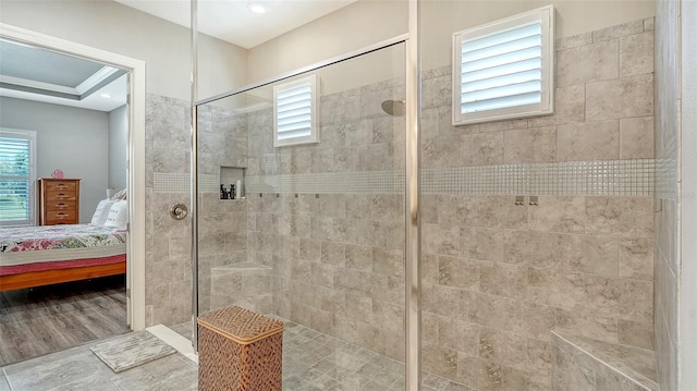 8713 Mangilli Rd, Sarasota, FL 34238 - ensuite bathroom with healthy amount of natural light and a shower stall