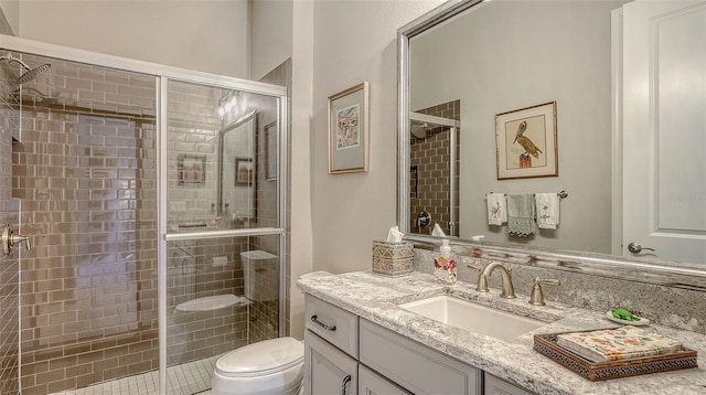 8713 Mangilli Rd, Sarasota, FL 34238 - bathroom featuring a shower stall, toilet, and vanity
