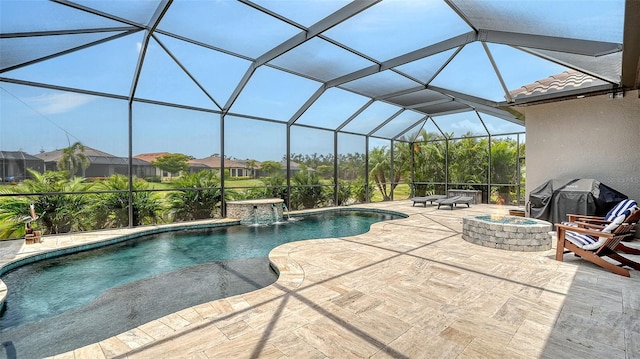8713 Mangilli Rd, Sarasota, FL 34238 - swimming pool with an outdoor fire pit, a patio area, a lanai, and area for grilling