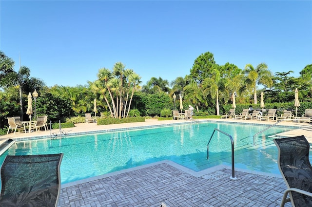 pool with a patio