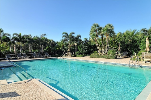 pool with a patio area