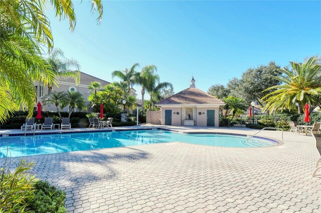 pool with a patio
