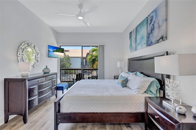 bedroom featuring ceiling fan, wood finished floors, and access to exterior