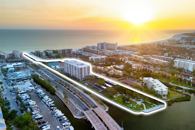 6415 Midnight Pass Rd Unit 204, Sarasota, FL 34242 - aerial view at dusk of a city view and a water view