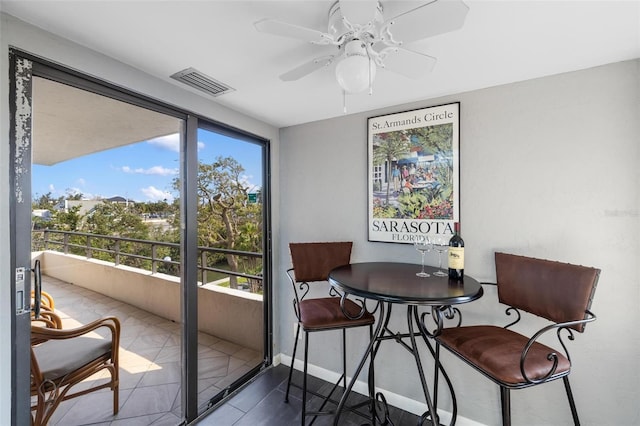 6415 Midnight Pass Rd Unit 204, Sarasota, FL 34242 - dining room with ceiling fan and baseboards