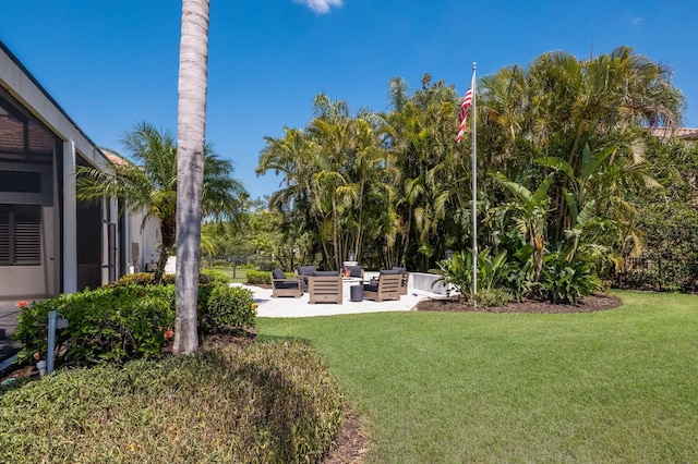 view of yard featuring a patio area and outdoor lounge area