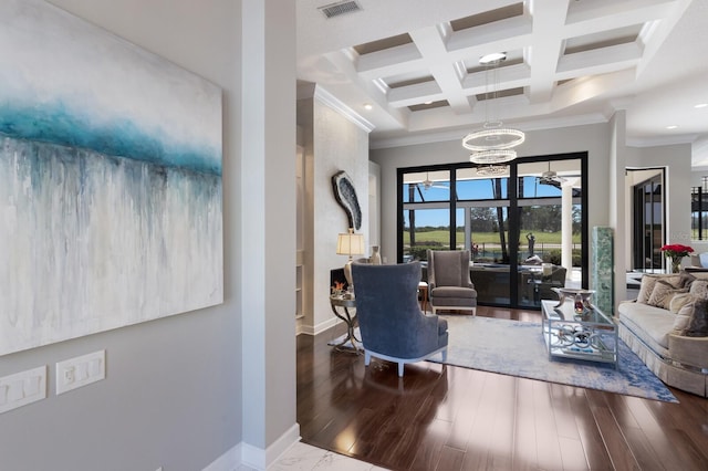 living room featuring coffered ceiling, baseboards, visible vents, crown molding, and beam ceiling