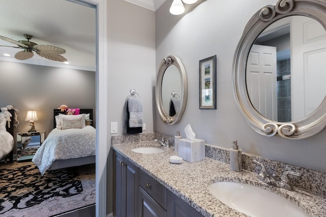 full bathroom with a ceiling fan, ensuite bathroom, crown molding, and a sink