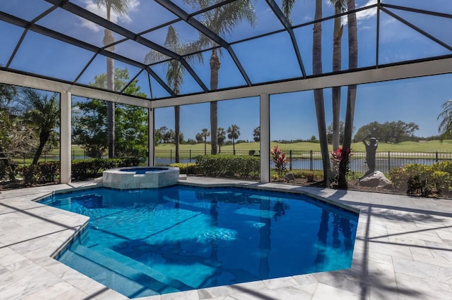 view of pool featuring a patio, a pool with connected hot tub, and fence