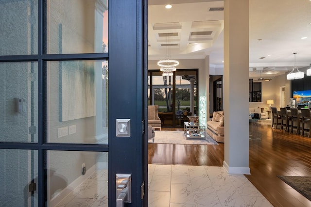 interior space with baseboards, marble finish floor, beamed ceiling, and coffered ceiling