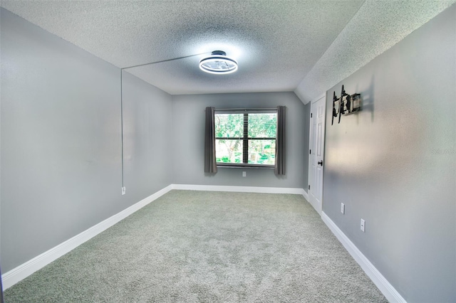 625 30th Ave W Unit G210, Bradenton, FL 34205 - carpeted spare room featuring a textured ceiling and baseboards
