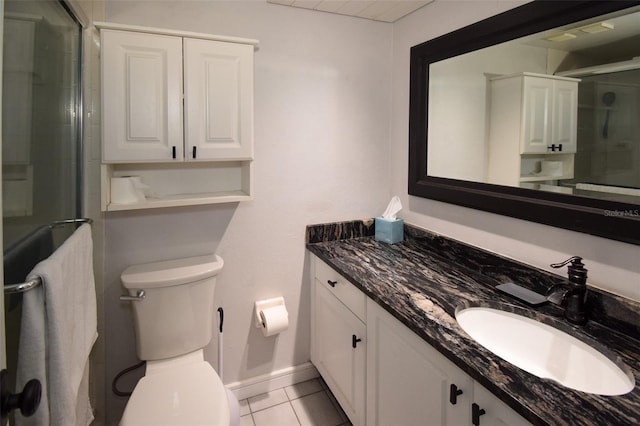 625 30th Ave W Unit G210, Bradenton, FL 34205 - full bath featuring vanity, tile patterned floors, and an enclosed shower