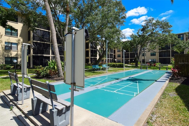 625 30th Ave W Unit G210, Bradenton, FL 34205 - view of community featuring shuffleboard and a yard