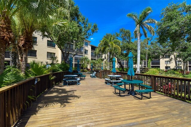 625 30th Ave W Unit G210, Bradenton, FL 34205 - wooden deck with outdoor dining area