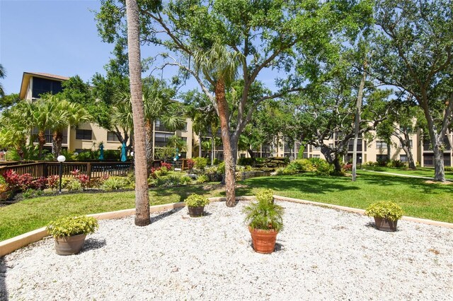 625 30th Ave W Unit G210, Bradenton, FL 34205 - view of property's community with a yard
