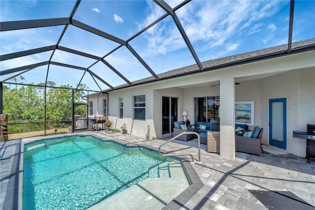 pool with a patio area, a lanai, and an outdoor hangout area