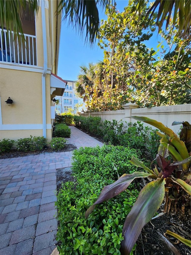 116 Navigation Cir Unit 106, Osprey, FL 34229 - view of yard with a patio and fence